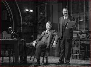 John Slattery, seated, and Nathan Lane in "The Front Page"